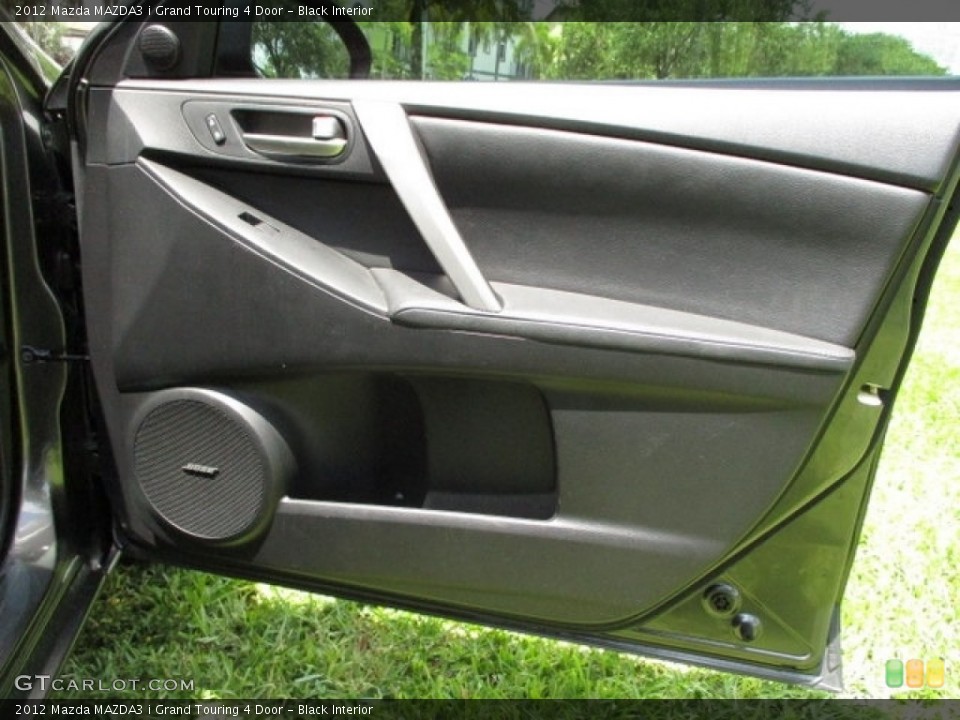 Black Interior Door Panel for the 2012 Mazda MAZDA3 i Grand Touring 4 Door #138941870