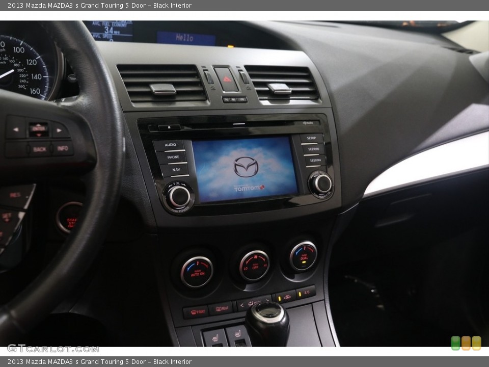Black Interior Controls for the 2013 Mazda MAZDA3 s Grand Touring 5 Door #139009236