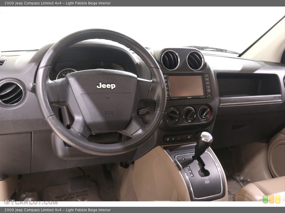 Light Pebble Beige Interior Dashboard for the 2009 Jeep Compass Limited 4x4 #139065822