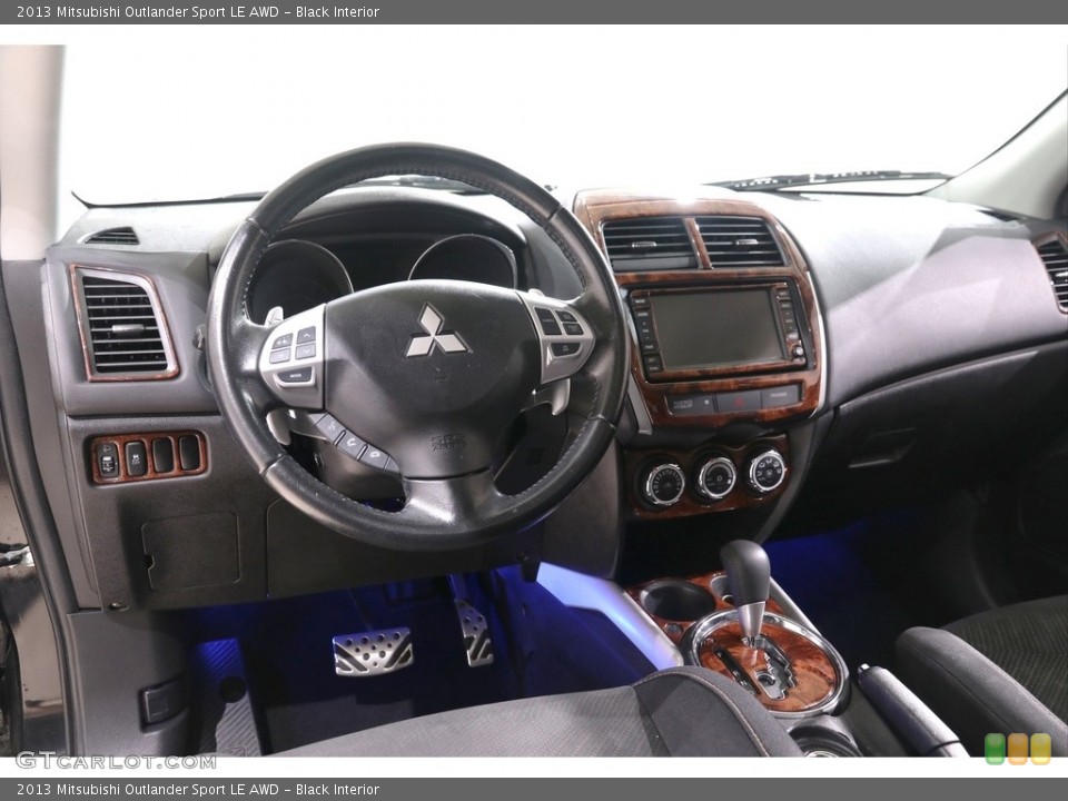 Black Interior Dashboard for the 2013 Mitsubishi Outlander Sport LE AWD #139112521