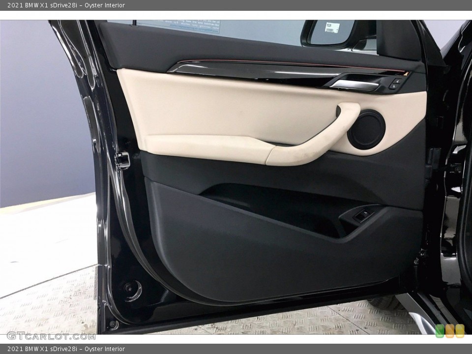 Oyster Interior Door Panel for the 2021 BMW X1 sDrive28i #139424202