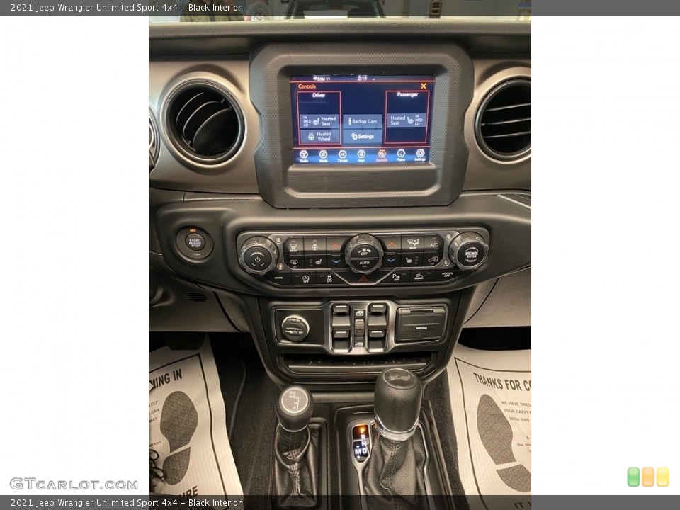 Black Interior Controls for the 2021 Jeep Wrangler Unlimited Sport 4x4 #139475611