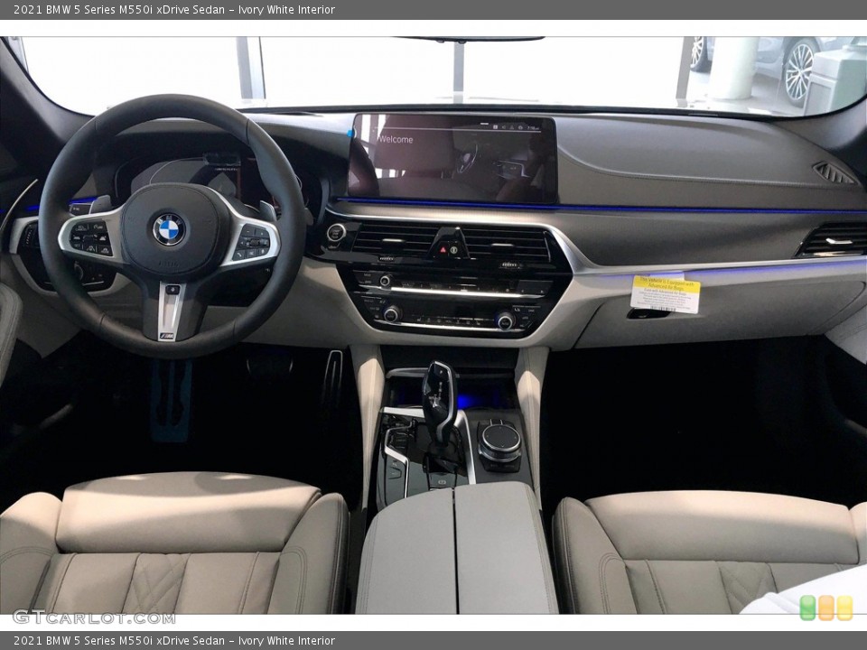 Ivory White Interior Photo for the 2021 BMW 5 Series M550i xDrive Sedan #139563491