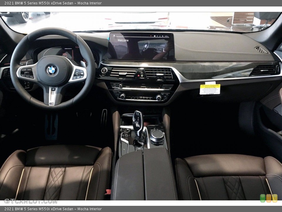 Mocha Interior Dashboard for the 2021 BMW 5 Series M550i xDrive Sedan #139564025
