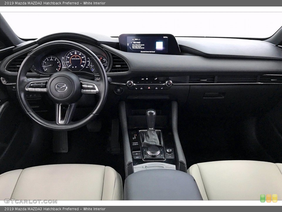 White Interior Dashboard for the 2019 Mazda MAZDA3 Hatchback Preferred #139669950