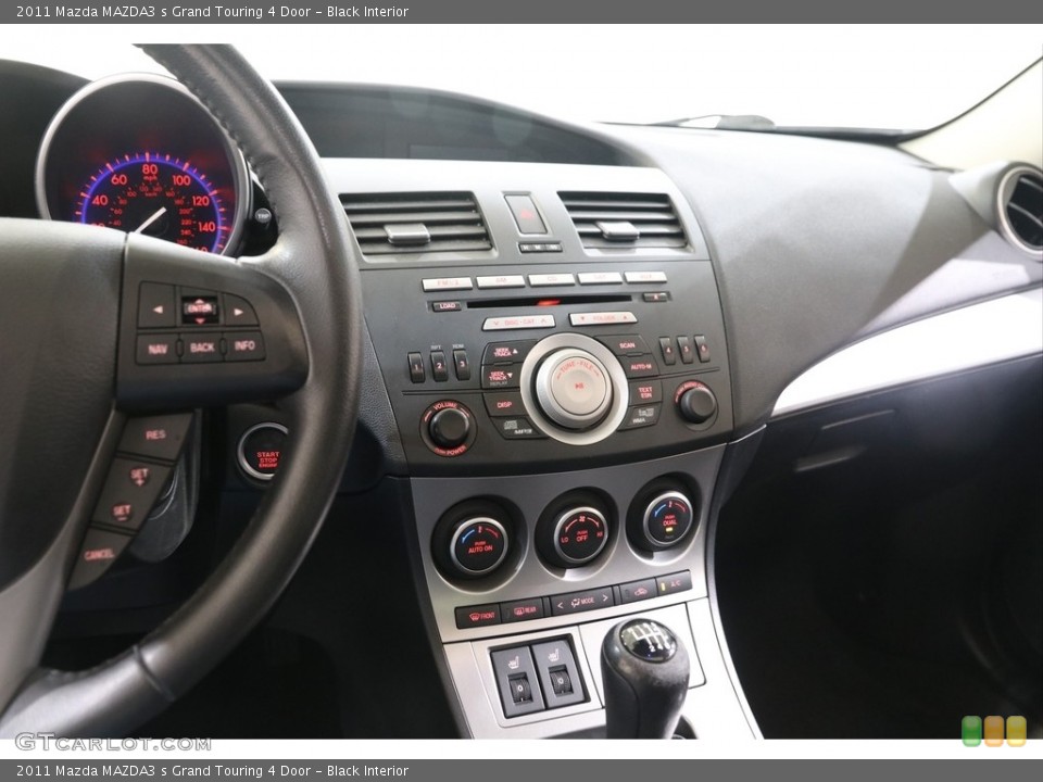 Black Interior Controls for the 2011 Mazda MAZDA3 s Grand Touring 4 Door #139694574