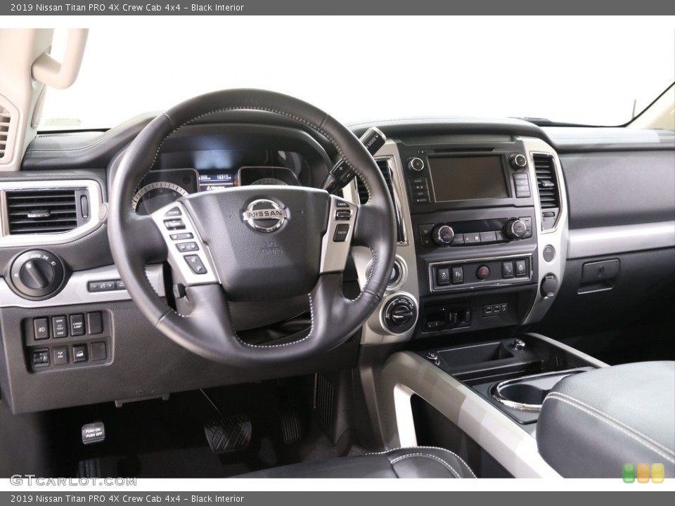 Black Interior Dashboard for the 2019 Nissan Titan PRO 4X Crew Cab 4x4 #139738634