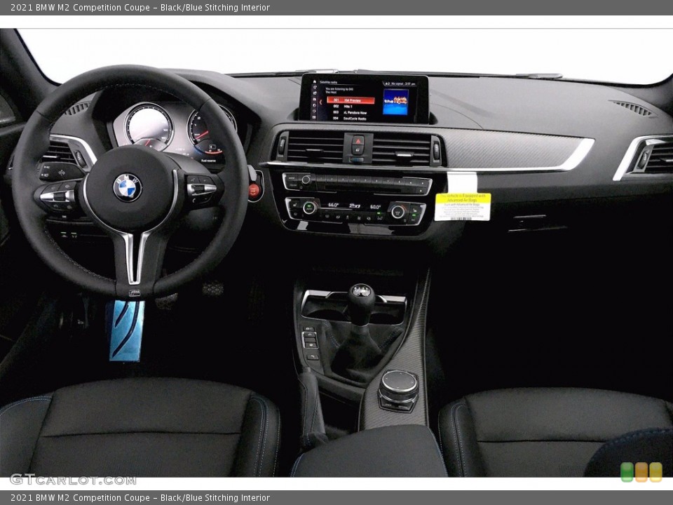 Black/Blue Stitching Interior Dashboard for the 2021 BMW M2 Competition Coupe #139744518
