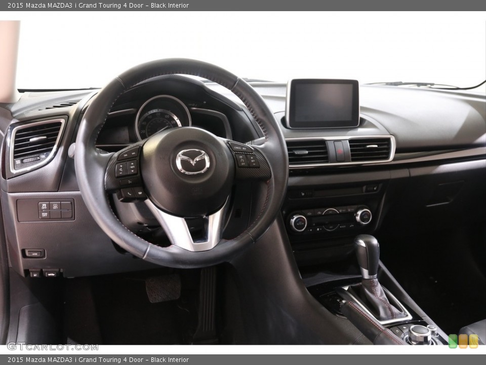 Black Interior Dashboard for the 2015 Mazda MAZDA3 i Grand Touring 4 Door #139839576