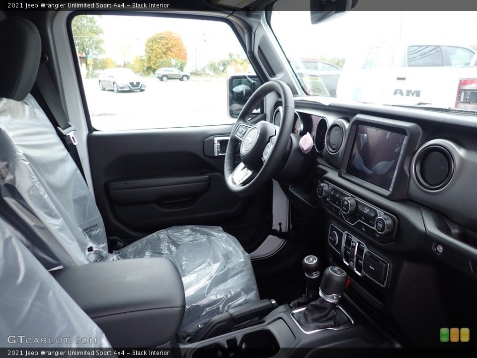 Black Interior Dashboard for the 2021 Jeep Wrangler Unlimited Sport 4x4 #139863710
