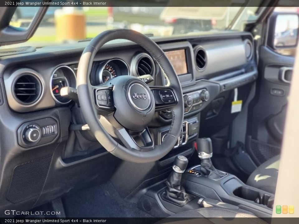 Black Interior Dashboard for the 2021 Jeep Wrangler Unlimited Sport 4x4 #139889637