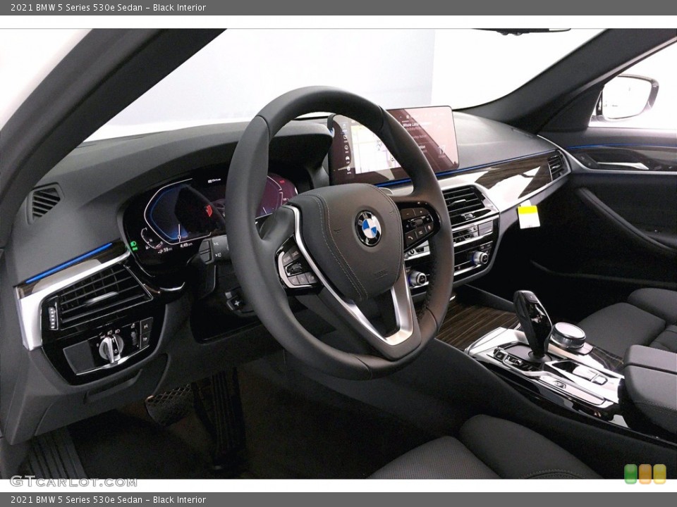 Black Interior Steering Wheel for the 2021 BMW 5 Series 530e Sedan #139914599
