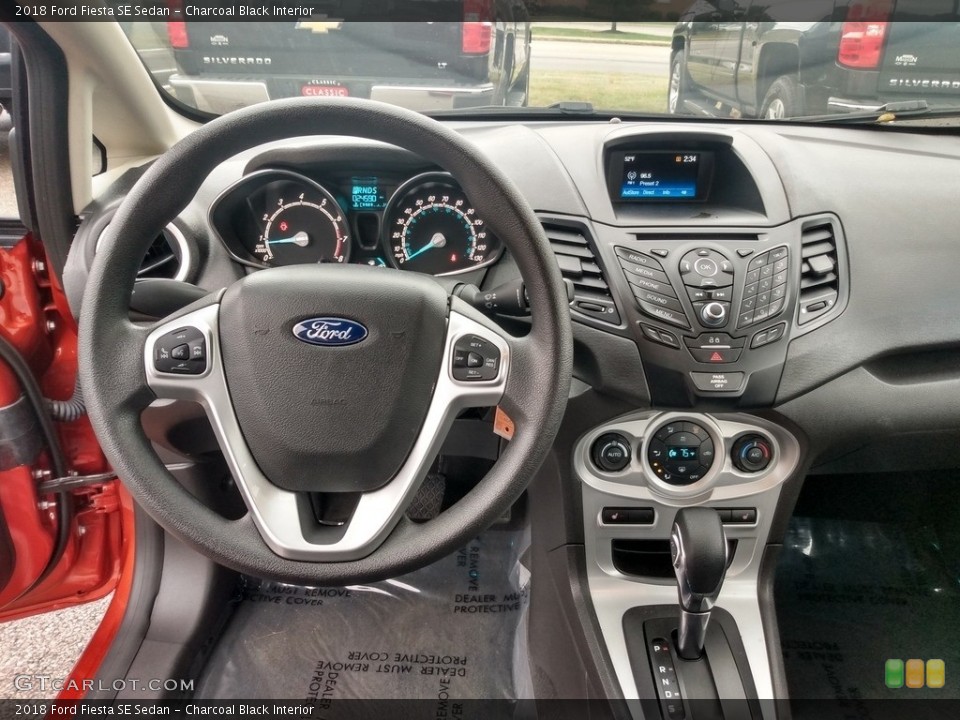 Charcoal Black Interior Dashboard for the 2018 Ford Fiesta SE Sedan #139930867