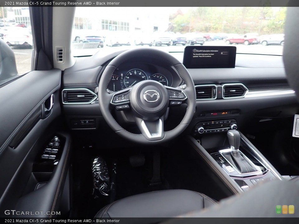 Black Interior Dashboard for the 2021 Mazda CX-5 Grand Touring Reserve AWD #139938225