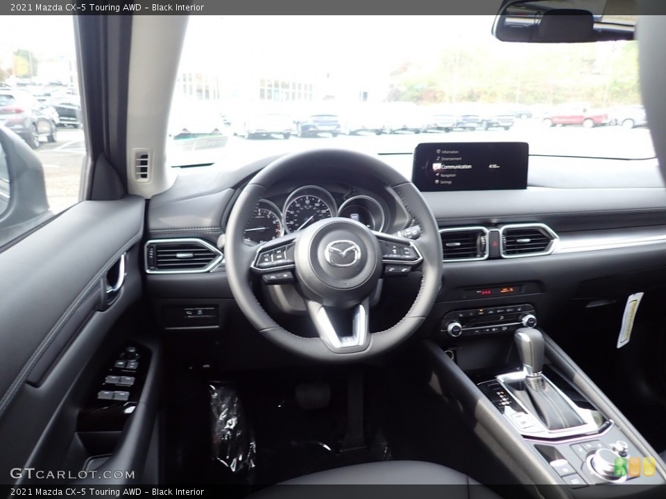 Black Interior Dashboard for the 2021 Mazda CX-5 Touring AWD #139938618