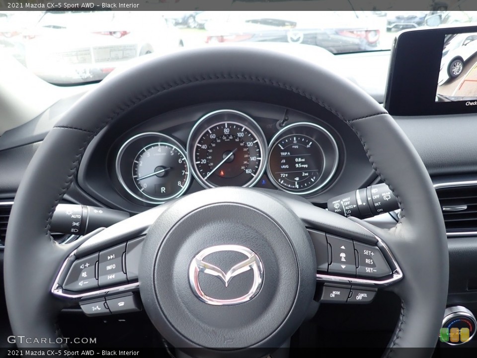 Black Interior Steering Wheel for the 2021 Mazda CX-5 Sport AWD #139939107
