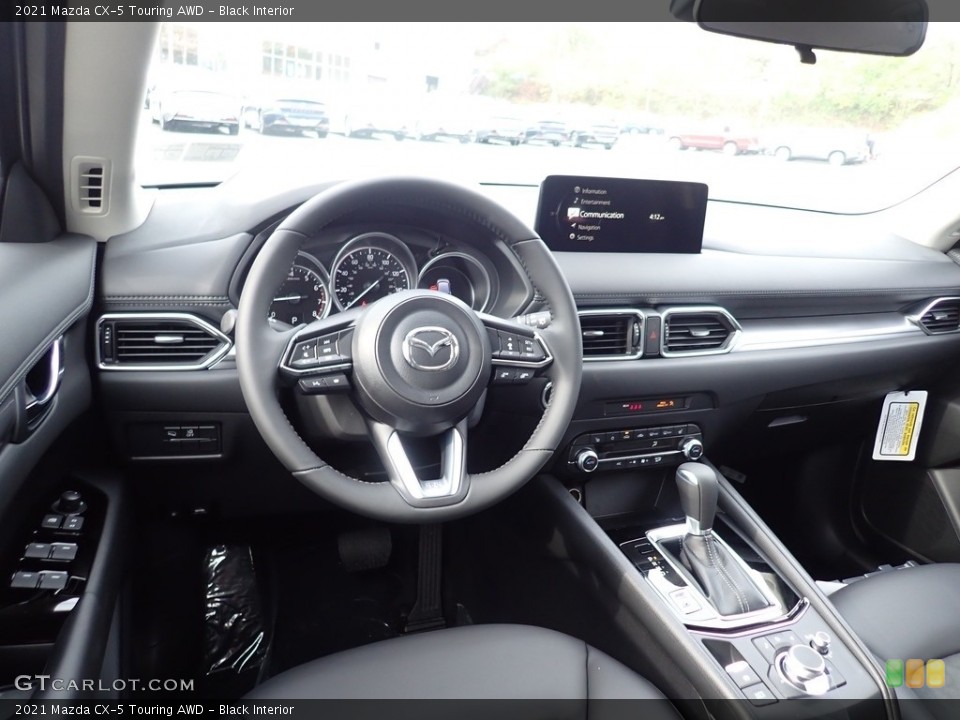 Black Interior Dashboard for the 2021 Mazda CX-5 Touring AWD #139939338