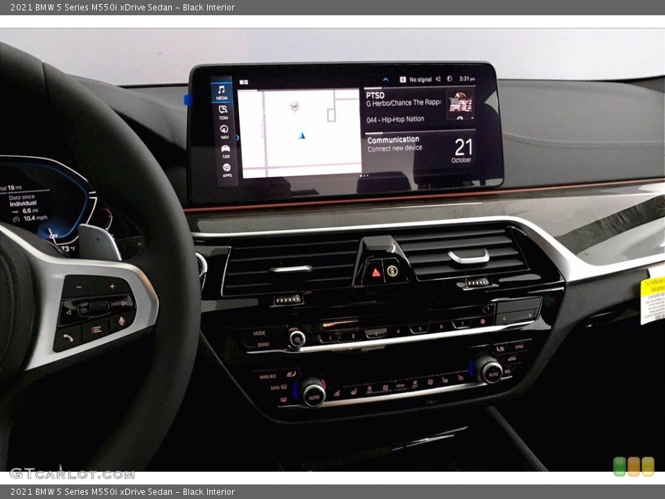 Black Interior Controls for the 2021 BMW 5 Series M550i xDrive Sedan #139951608