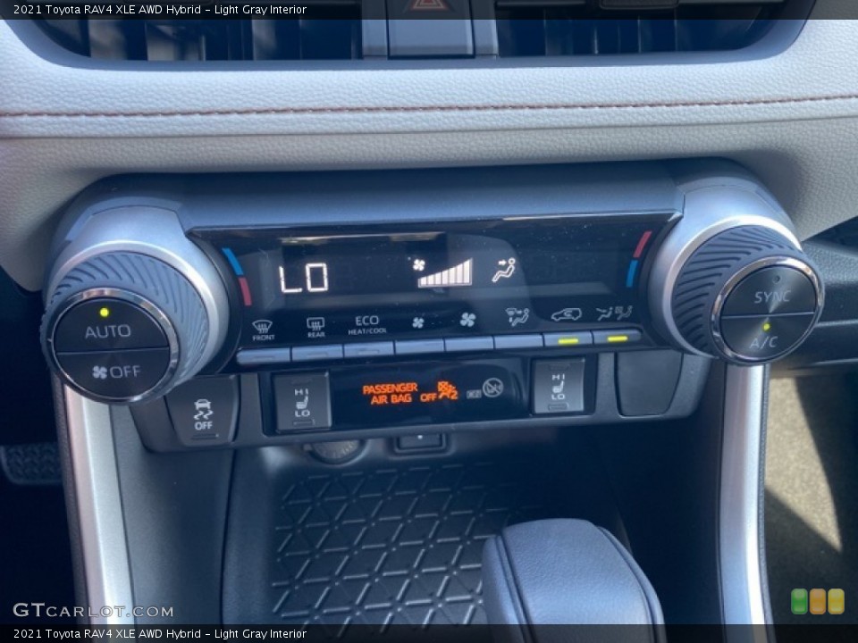 Light Gray Interior Controls for the 2021 Toyota RAV4 XLE AWD Hybrid #139965883