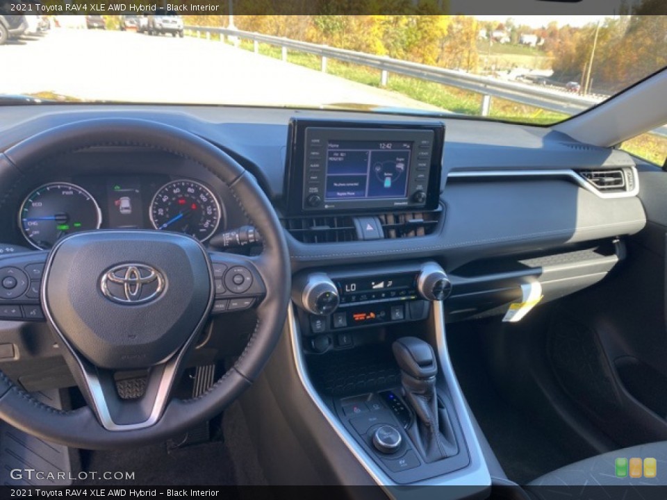 Black Interior Dashboard for the 2021 Toyota RAV4 XLE AWD Hybrid #139966573
