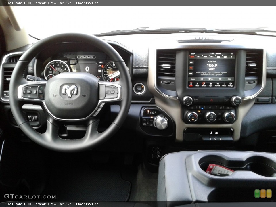 Black Interior Dashboard for the 2021 Ram 1500 Laramie Crew Cab 4x4 #139976098