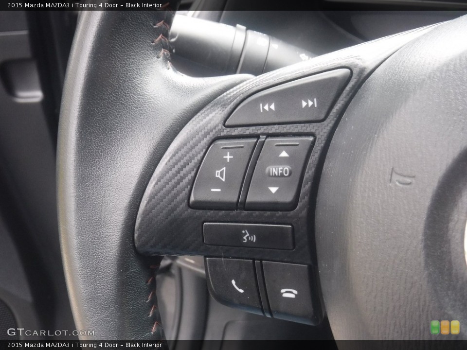 Black Interior Steering Wheel for the 2015 Mazda MAZDA3 i Touring 4 Door #140006869