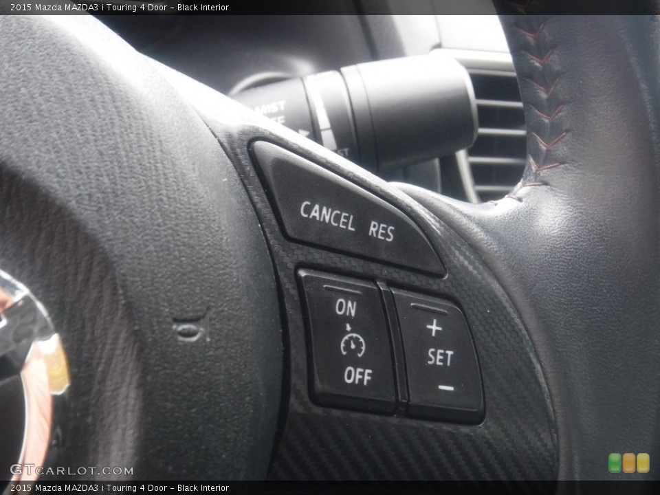 Black Interior Steering Wheel for the 2015 Mazda MAZDA3 i Touring 4 Door #140006880