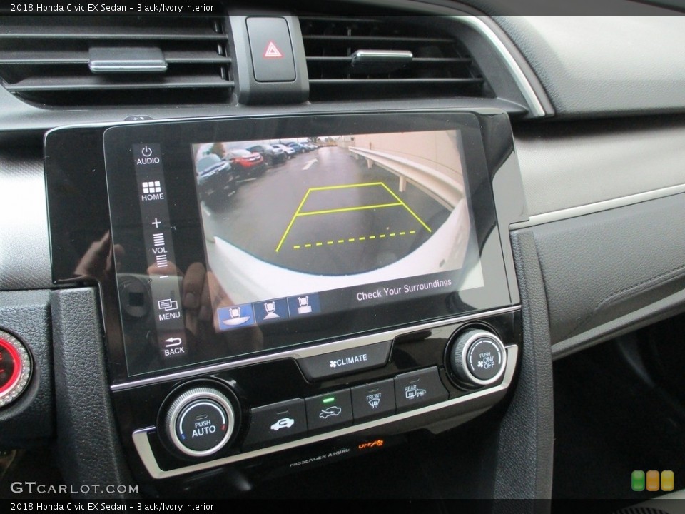Black/Ivory Interior Controls for the 2018 Honda Civic EX Sedan #140050477