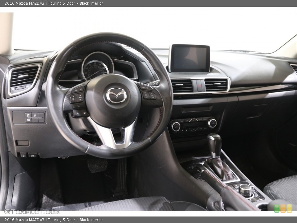 Black Interior Dashboard for the 2016 Mazda MAZDA3 i Touring 5 Door #140090326
