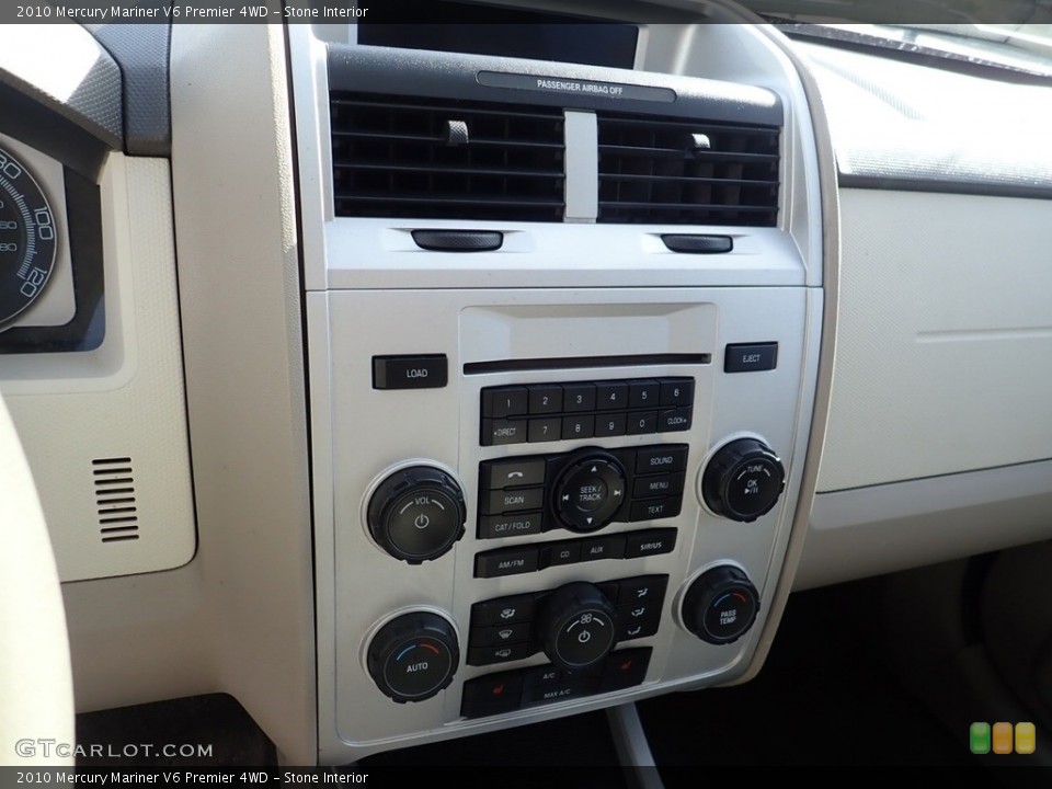 Stone Interior Controls for the 2010 Mercury Mariner V6 Premier 4WD #140109421
