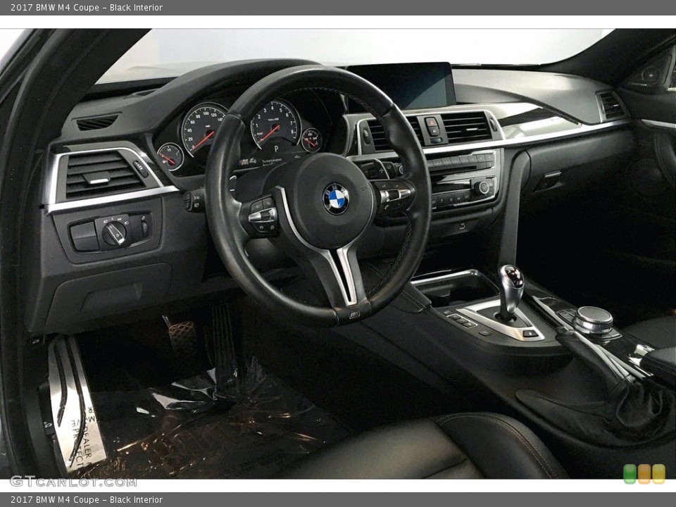 Black Interior Steering Wheel for the 2017 BMW M4 Coupe #140194356
