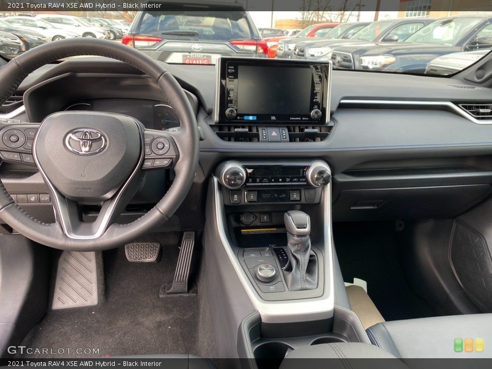 Black Interior Dashboard for the 2021 Toyota RAV4 XSE AWD Hybrid #140203014