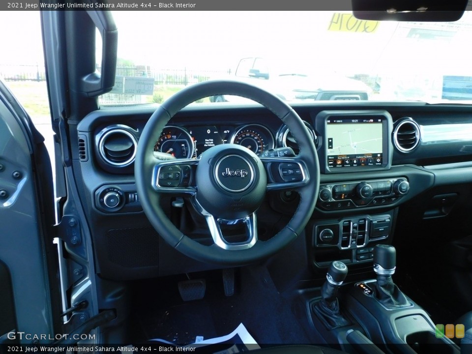 Black Interior Dashboard for the 2021 Jeep Wrangler Unlimited Sahara Altitude 4x4 #140210307