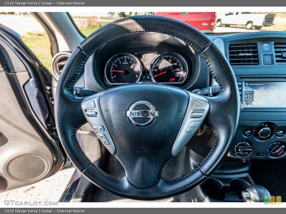 Charcoal Interior Steering Wheel for the 2016 Nissan Versa S Sedan #140219110