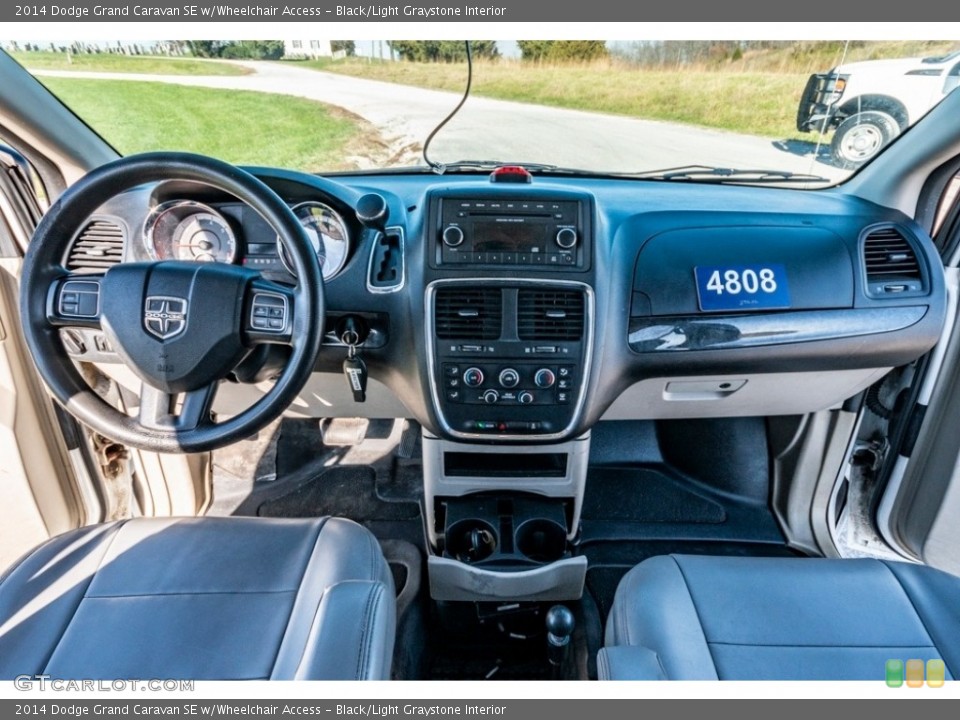 Black/Light Graystone Interior Dashboard for the 2014 Dodge Grand Caravan SE w/Wheelchair Access #140219758