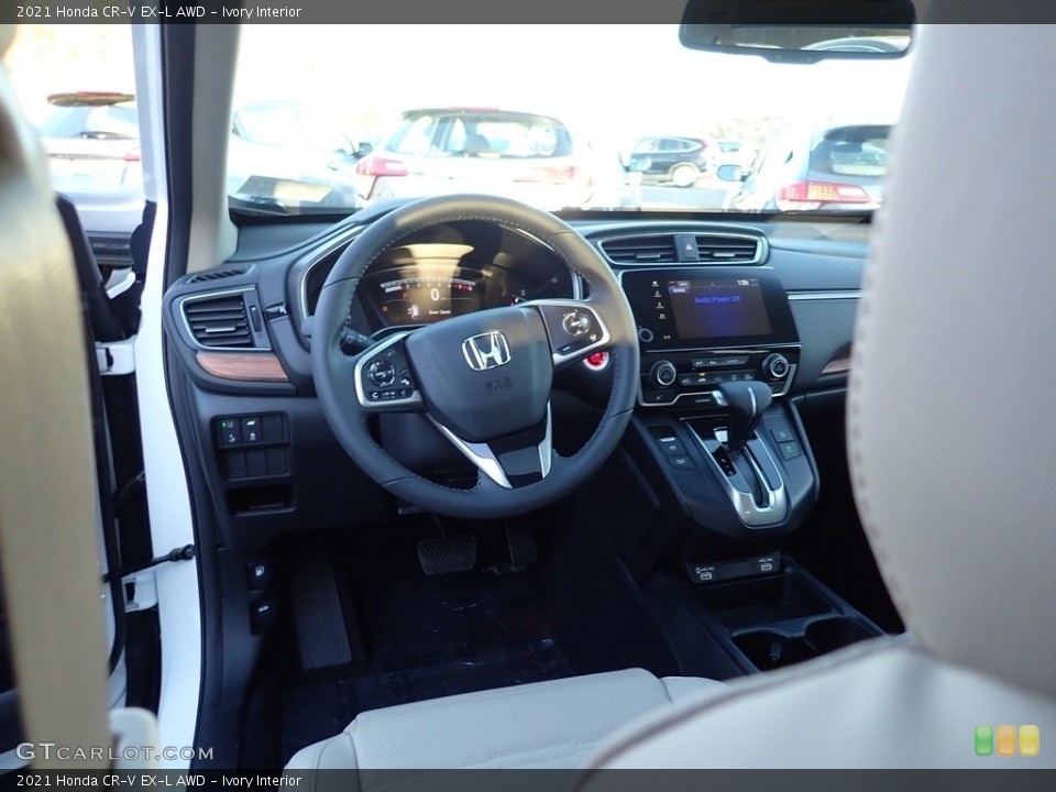 Ivory Interior Dashboard for the 2021 Honda CR-V EX-L AWD #140221063