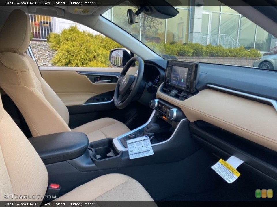 Nutmeg Interior Dashboard for the 2021 Toyota RAV4 XLE AWD Hybrid #140248439