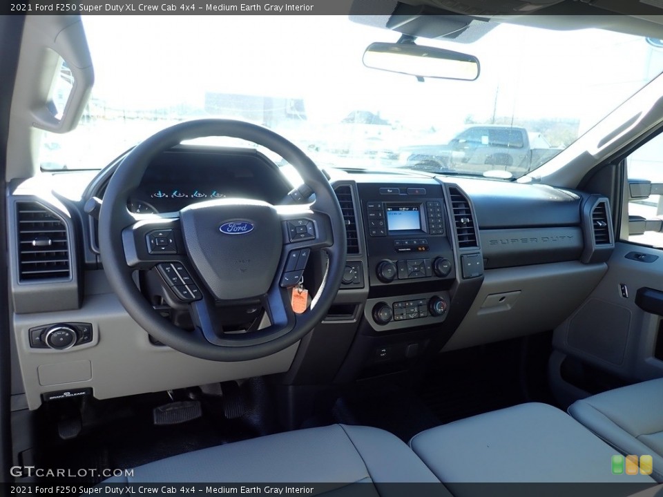 Medium Earth Gray Interior Dashboard for the 2021 Ford F250 Super Duty XL Crew Cab 4x4 #140260328