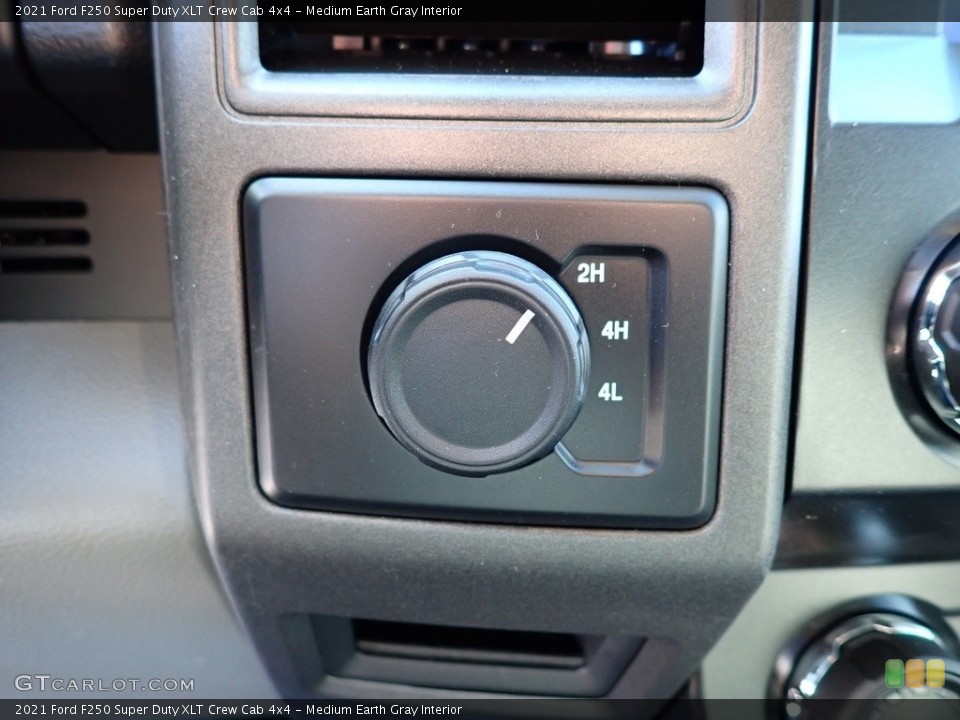 Medium Earth Gray Interior Controls for the 2021 Ford F250 Super Duty XLT Crew Cab 4x4 #140260943