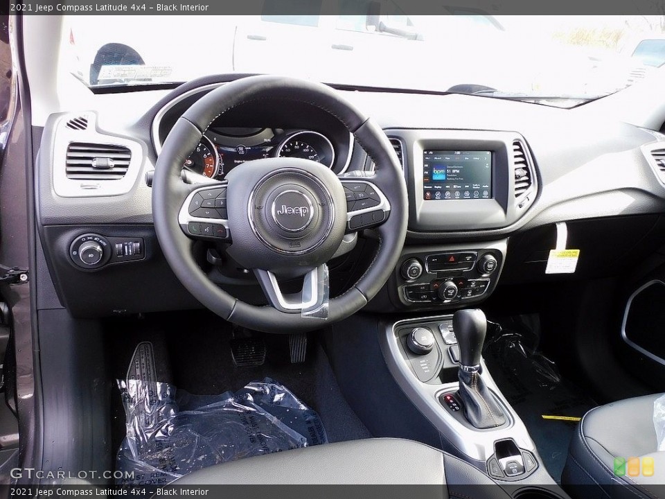 Black Interior Dashboard for the 2021 Jeep Compass Latitude 4x4 #140397925