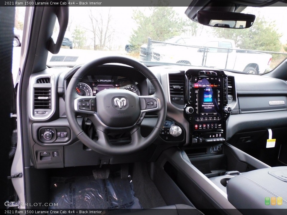 Black Interior Dashboard for the 2021 Ram 1500 Laramie Crew Cab 4x4 #140445527