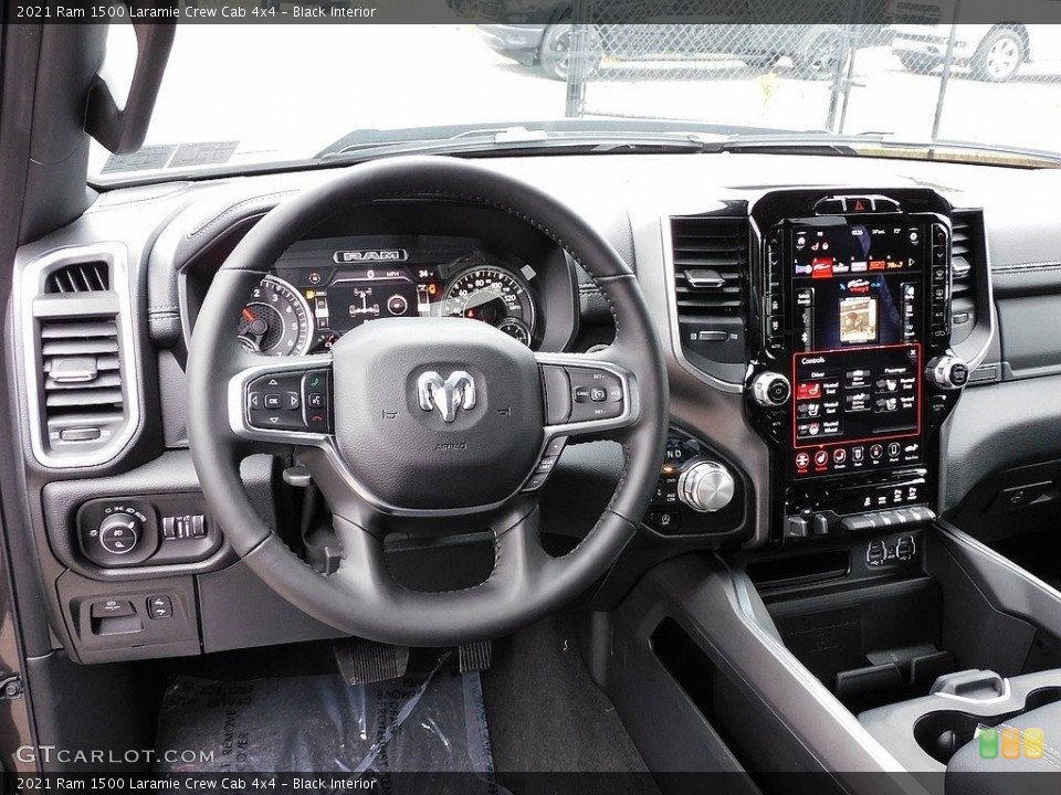 Black Interior Dashboard for the 2021 Ram 1500 Laramie Crew Cab 4x4 #140445869