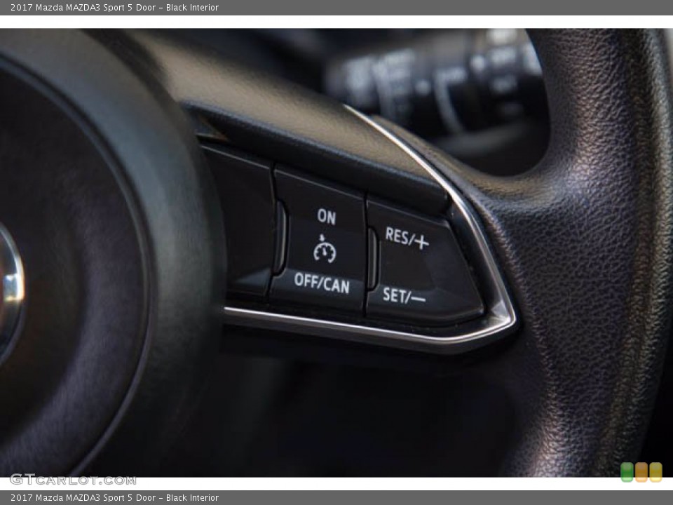 Black Interior Steering Wheel for the 2017 Mazda MAZDA3 Sport 5 Door #140475847