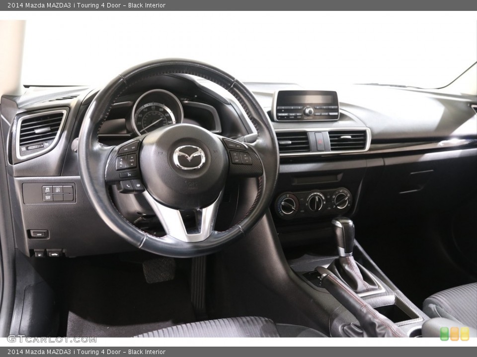 Black Interior Dashboard for the 2014 Mazda MAZDA3 i Touring 4 Door #140492848