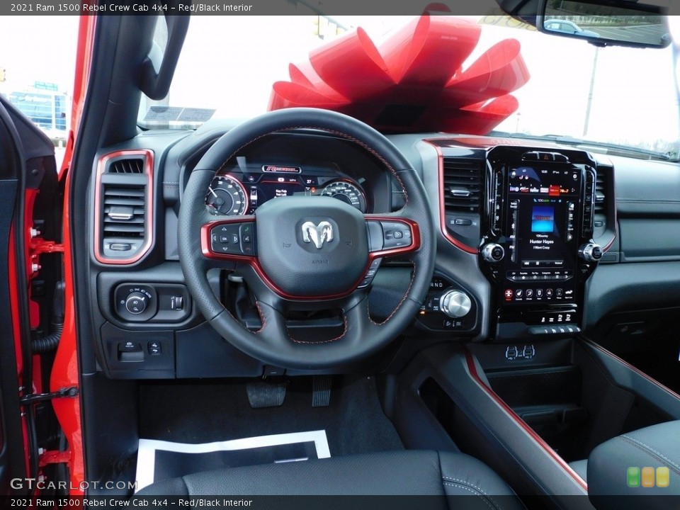 Red/Black Interior Dashboard for the 2021 Ram 1500 Rebel Crew Cab 4x4 #140509180