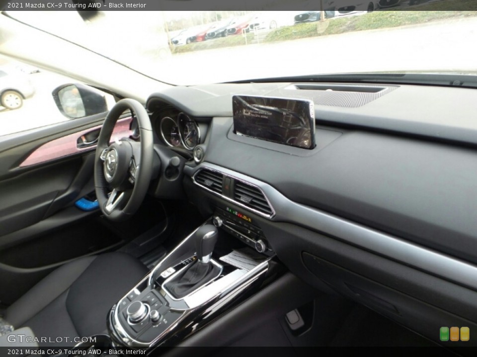 Black Interior Dashboard for the 2021 Mazda CX-9 Touring AWD #140516557
