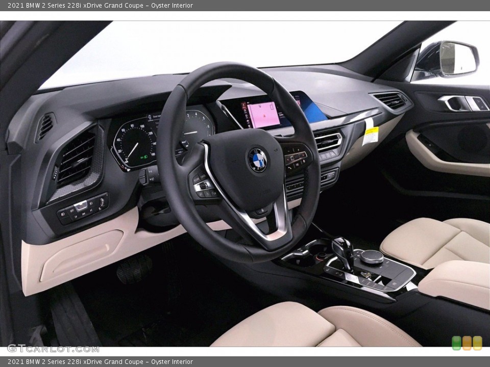 Oyster Interior Steering Wheel for the 2021 BMW 2 Series 228i xDrive Grand Coupe #140520148