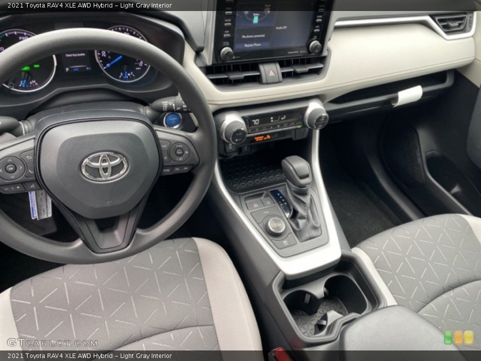 Light Gray Interior Controls for the 2021 Toyota RAV4 XLE AWD Hybrid #140573328