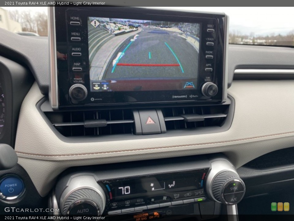 Light Gray Interior Controls for the 2021 Toyota RAV4 XLE AWD Hybrid #140573454
