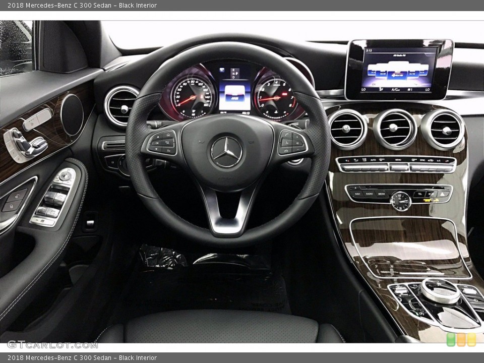 Black Interior Dashboard for the 2018 Mercedes-Benz C 300 Sedan #140616299